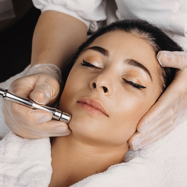 Woman getting a micro-laser peel at the Garlich facial plastics office.
