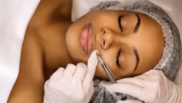 Woman receiving an injection